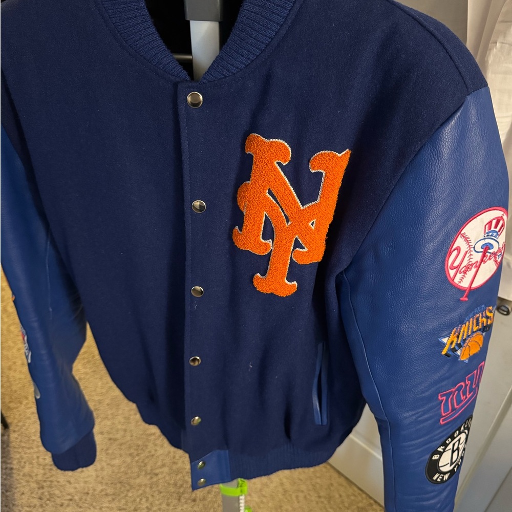 Victory brand Blue Varsity Jacket with Orange Logo